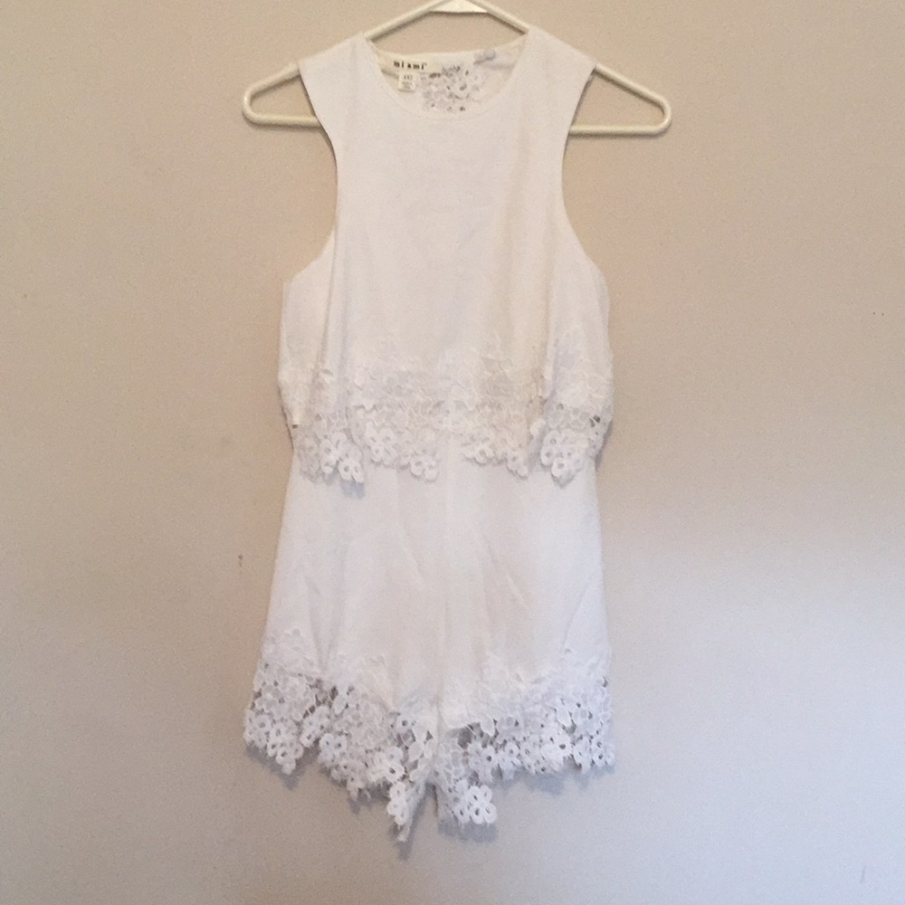 romper with lace details. Slight open back